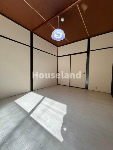 六十谷マンションの洋室