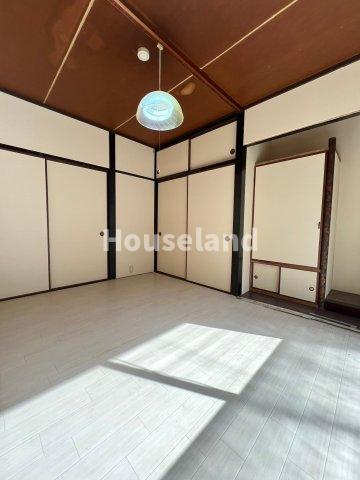 六十谷マンションの洋室