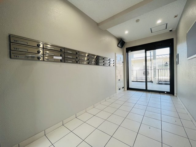 都城市金田町の賃貸マンションのエントランス