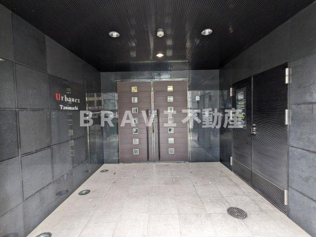 アーバネックス谷町　BRAVI不動産のエントランス