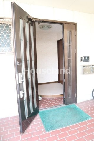 (有)河彦3Fのエントランス