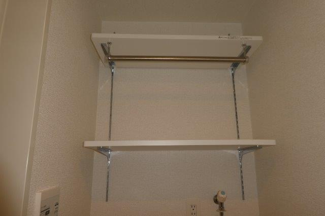 フューチャーSI　Ⅱの洗面所|洗濯機上棚