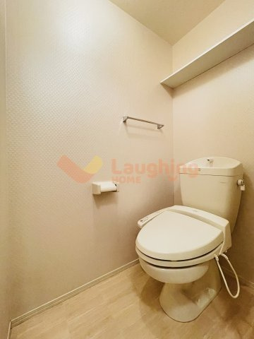 プレミスト B棟のトイレ|落ち着いた色調のトイレです