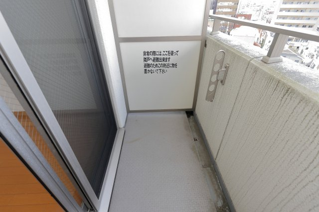 ザパームスシンコイワのバルコニー