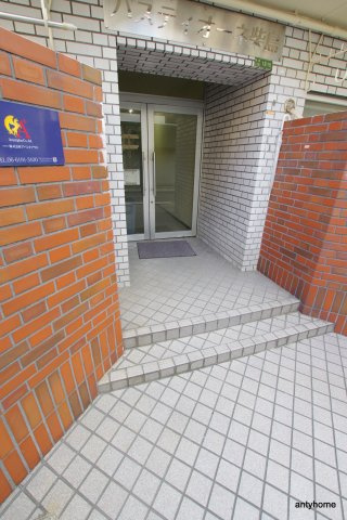 バスティオーネ柴島　仲介手数料無料のエントランス
