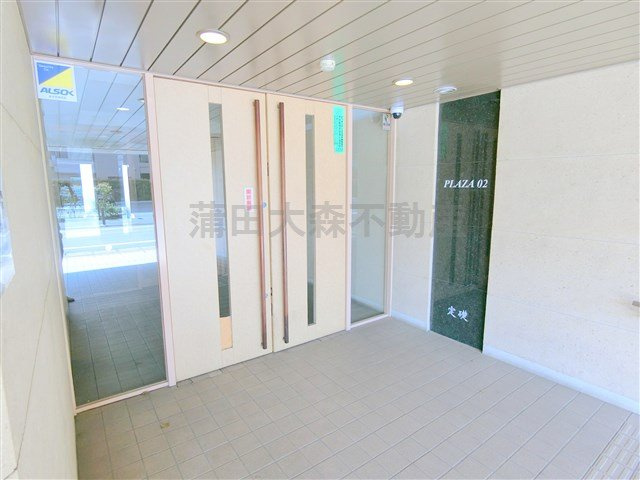 PLAZA02(プラザのエントランス|エントランス　防犯カメラ宅配BOXのあるエントランス