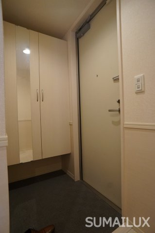 熊本市中央区春竹町大字春竹のアパートの玄関