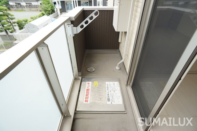 熊本市中央区春竹町大字春竹のアパートのバルコニー