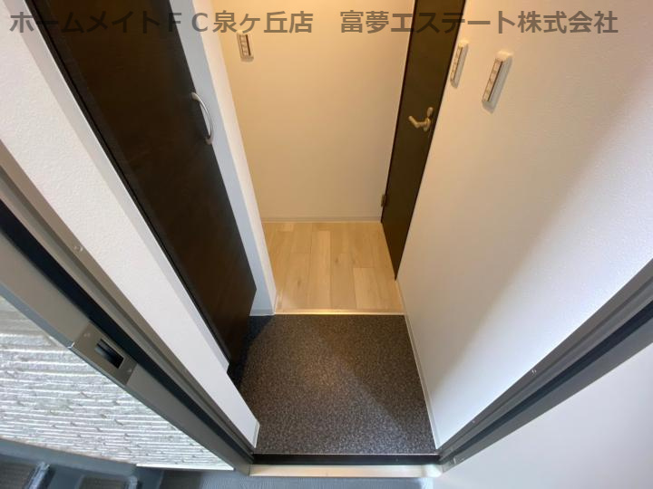 ジーメゾン高石千代田の玄関
