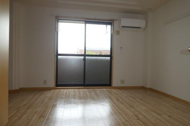 ルミナスハイムⅡの居間・リビング|洋室