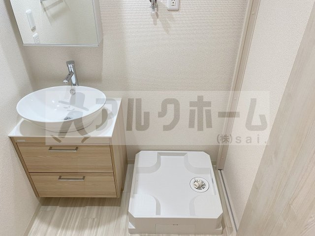 リバーサイド東久宝寺10番館の洗面所