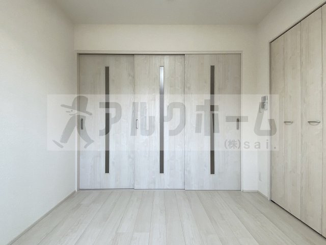 リバーサイド東久宝寺10番館の洋室