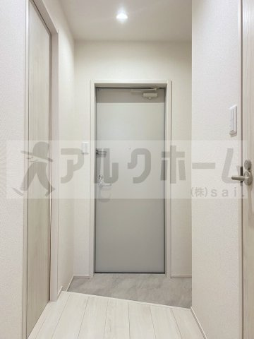 リバーサイド東久宝寺10番館の玄関