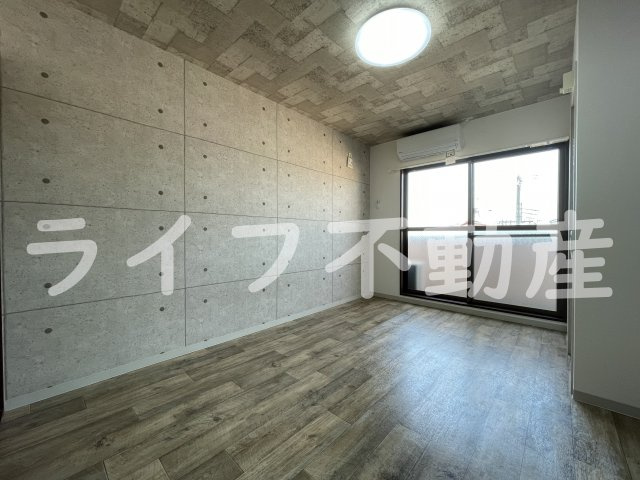 イーストヴィラキタの居間・リビング|こちらのリビングで趣味の時間をお楽しみください