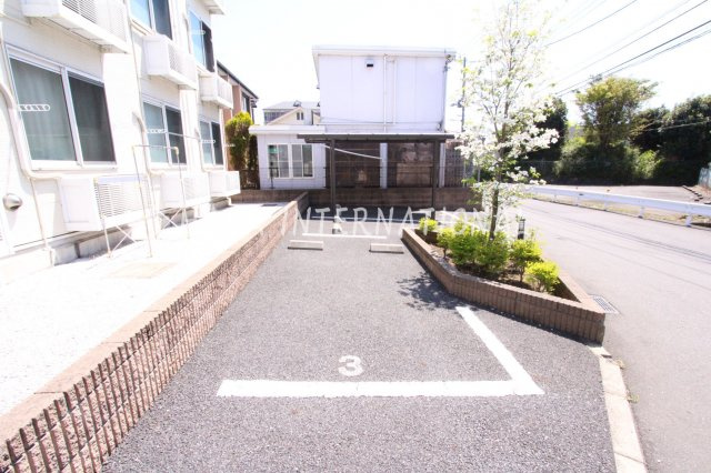 レオパレスウッドタウンの駐車場