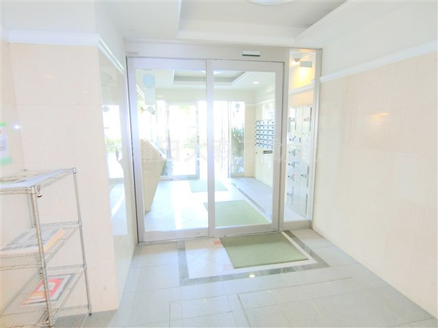 T.Kパレス梅屋敷のエントランス