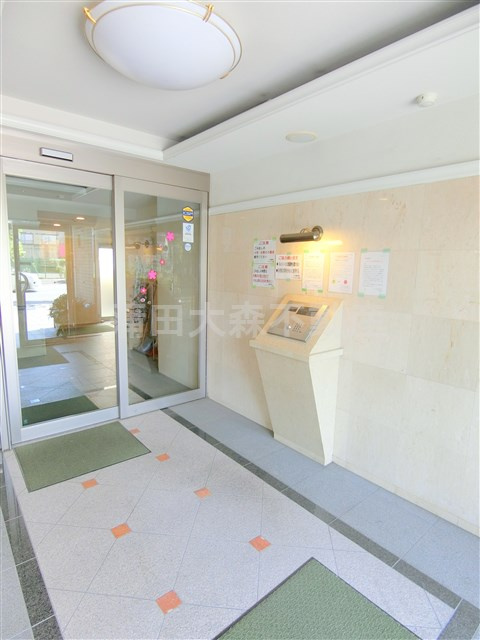T.Kパレス梅屋敷のエントランス