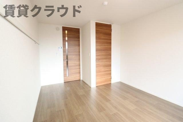 グランメゾンの寝室|落ち着いた色調の寝室です