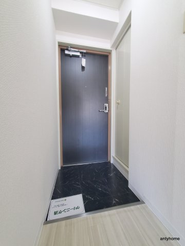 ロイヤルマンション十三　仲介手数料無料の玄関