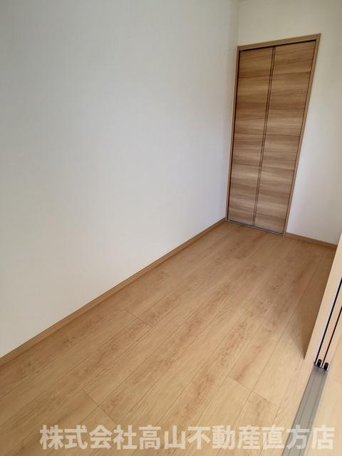 サンシティ直方の洋室