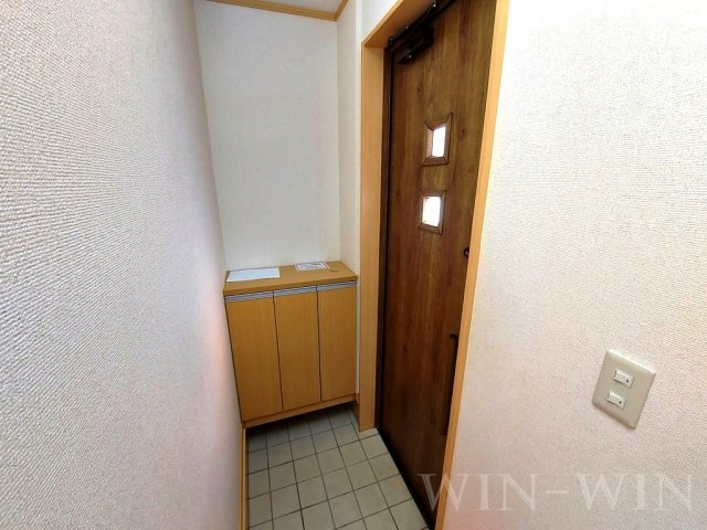 コモド南ヶ丘 Bの玄関