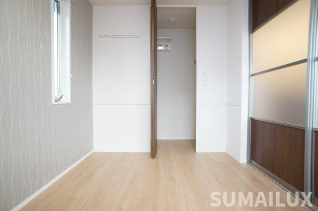 サンライズ新土河原の洋室