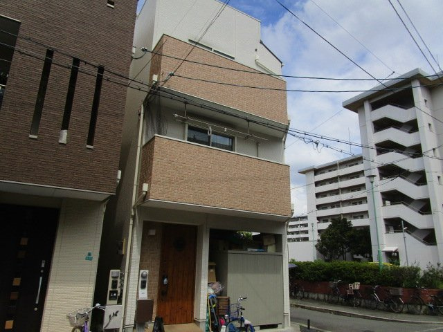 大阪市住之江区御崎４丁目の店付住宅の外観