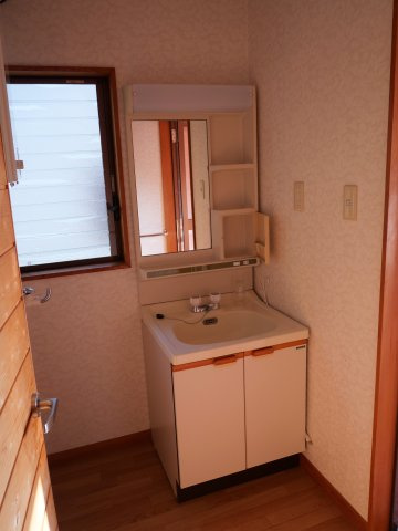 ニューパークひるが野①木造2階建の洗面所