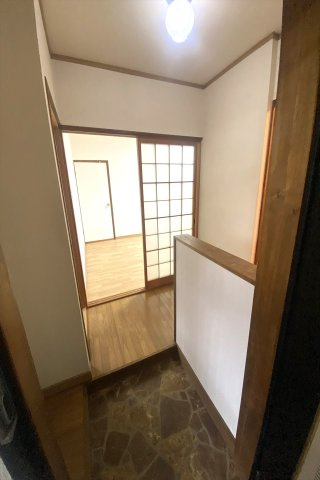 山城コーポＡ号棟の玄関