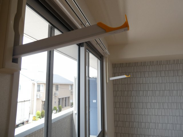 スタースレイプの居間・リビング|室内物干し