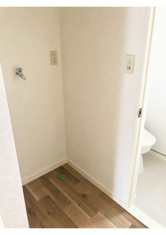 エステートピア志邑の設備|洗濯機置場です