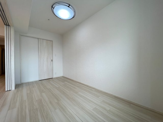Vinoプレジオ本町の洋室