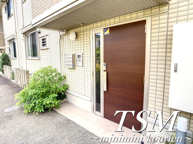 Ｇｒｅｅｎ　Ｖａｌｌｅｙ香里ヶ丘Ａ棟のエントランス