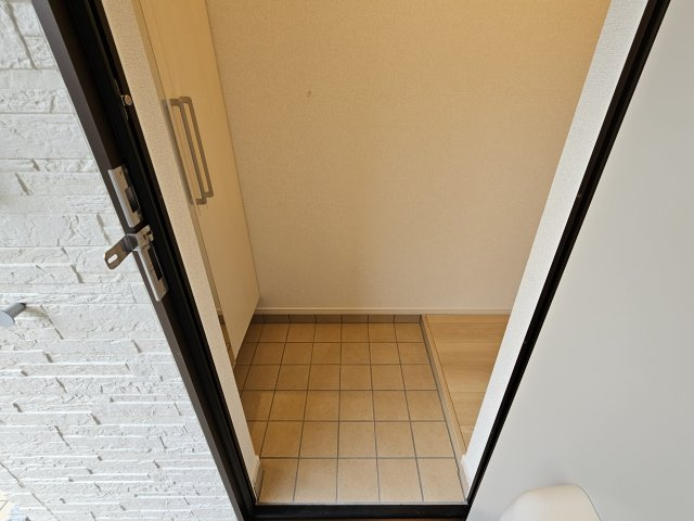 明石市西明石北町１丁目のアパートの玄関