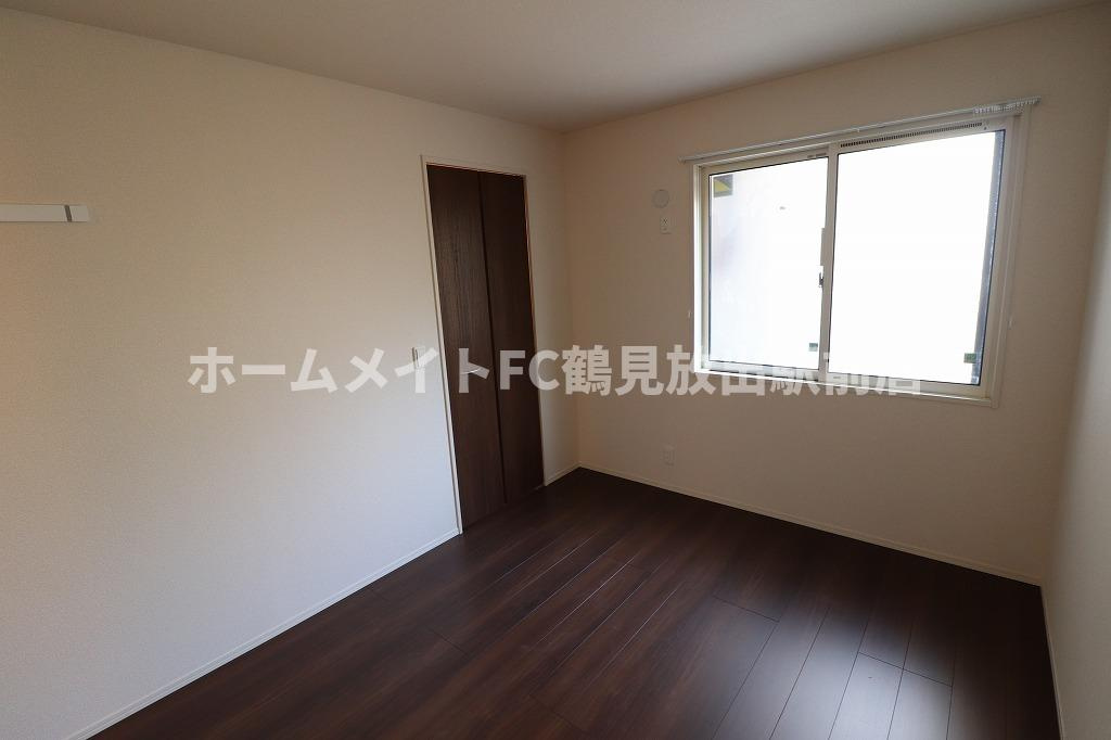 エストドミール東中浜の洋室