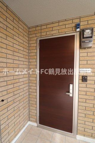 エストドミール東中浜の玄関