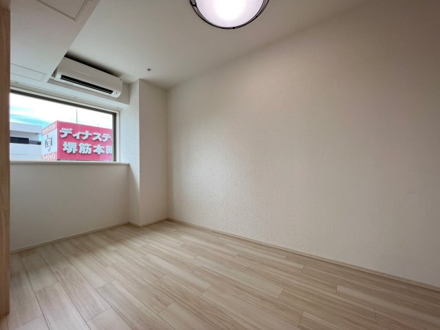 Vinoプレジオ本町の洋室