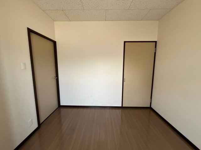 サンシティ小坂の寝室