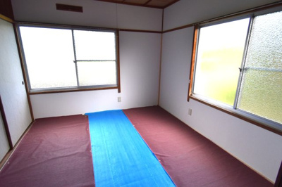 【和室】 | 野坂コーポラス | 畳は交換済みです（養生シートを張っています）