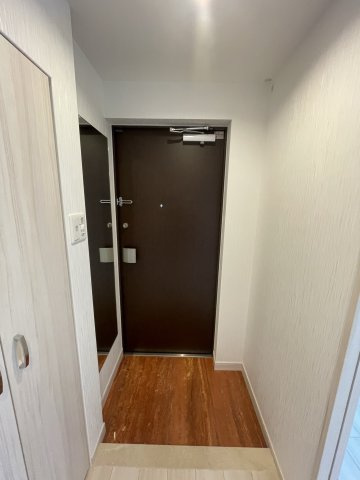 プレジオ江坂ROUGE　仲介手数料無料の玄関