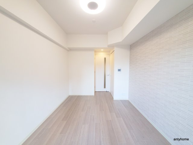 プレサンス大国町ラヴェニール　仲介手数料無料の洋室