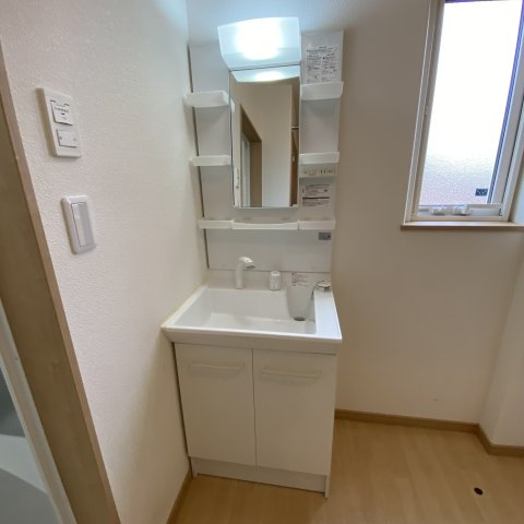 マヤパティオ　Ａ棟　（室蘭市共同住宅事業）の洗面所|コンパクトで使いやすい洗面所