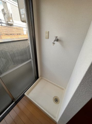 【設備】 | 丸忠ビル | 室内洗濯機置き場です