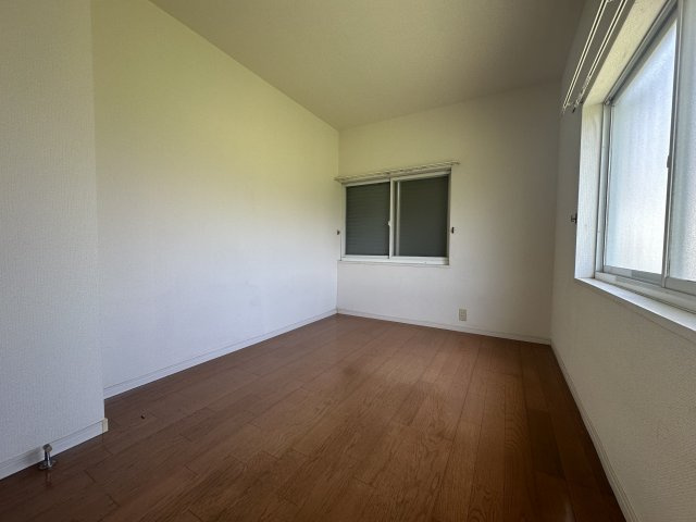 ハイツ西庄の寝室