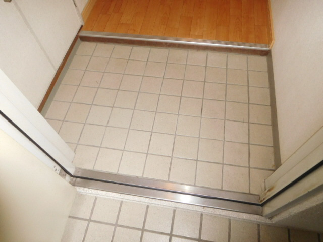 ピュアコート北八代の玄関