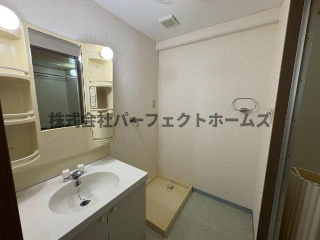 グランドヴィラ香里の洗面所|コンパクトで使いやすい洗面所