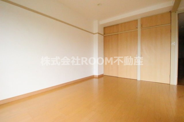 メゾンド妻ヶ丘の寝室|落ち着いた色調の寝室です