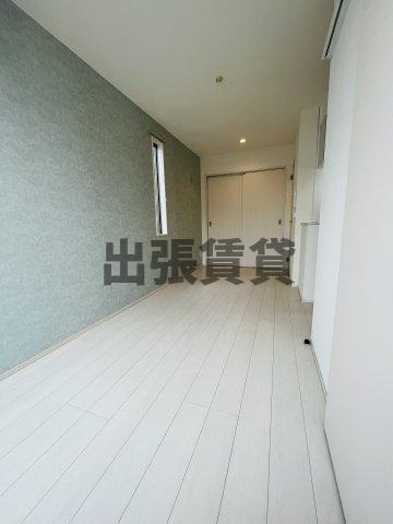 仲介手数料0円！GRANDTIC栄生駅前の居間・リビング