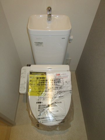 大阪市淀川区新北野１丁目の賃貸マンションのトイレ