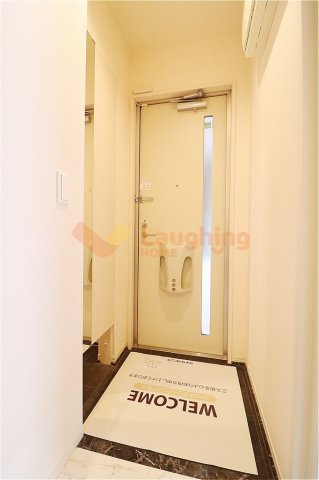 グラン エトワールA棟の玄関